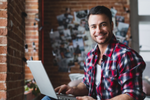 Male bookkeeper using laptop
