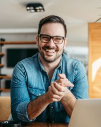 Portrait,Of,A,Successful,Entrepreneur,At,Cozy,Home,Office,,Smiling
