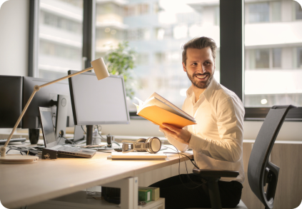 smiling_man_at_desk 2